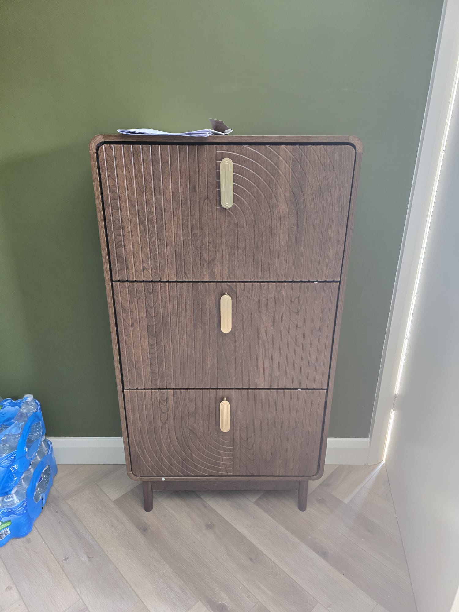 Walnut tall chest of drawers with brass handles