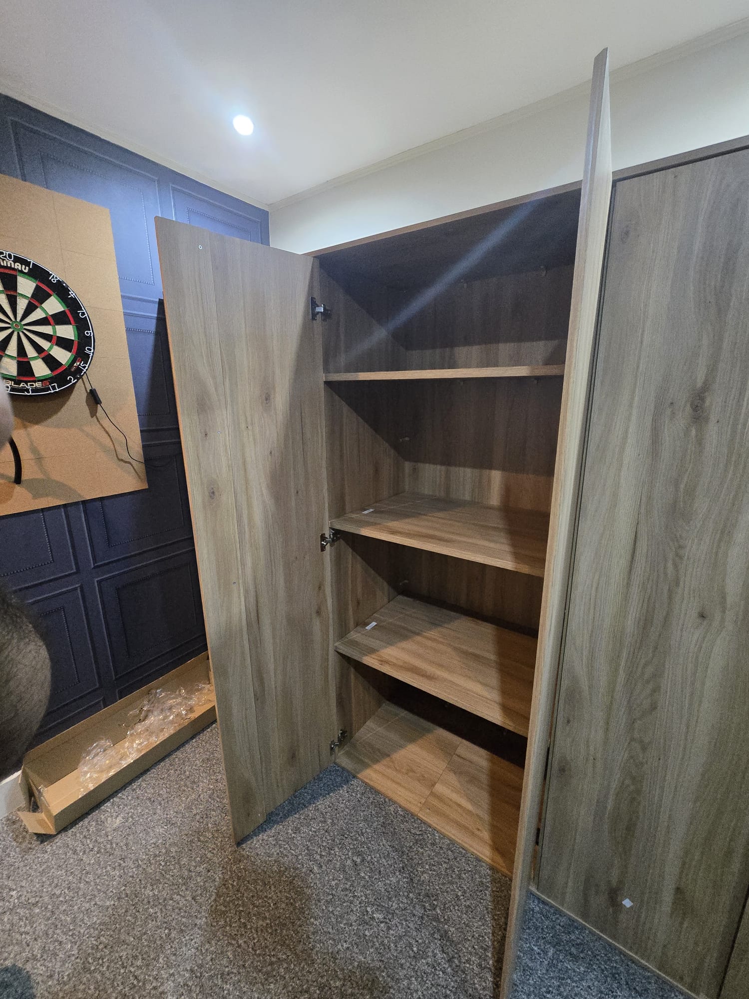 Wooden double wardrobe with adjustable shelving